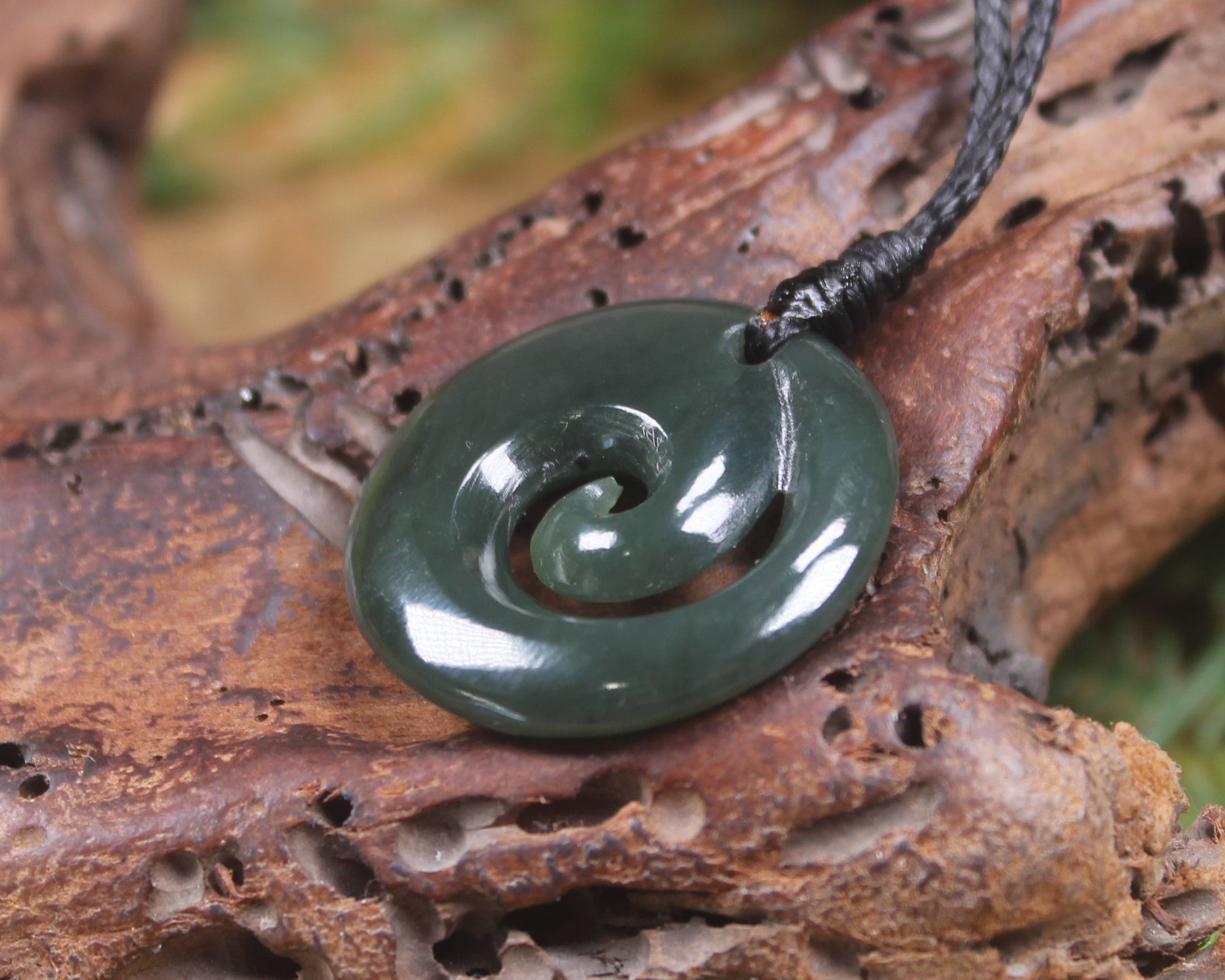 Koru pendant carved from Inanga Pounamu - NZ Greenstone