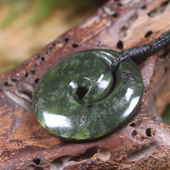 Koru carved from Rimu Pounamu - NZ Greenstone