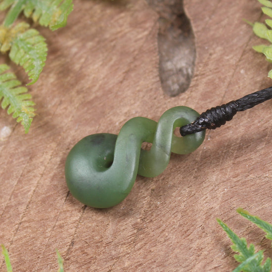 Twist or Pikorua carved from Hapopo Pounamu - NZ Greenstone