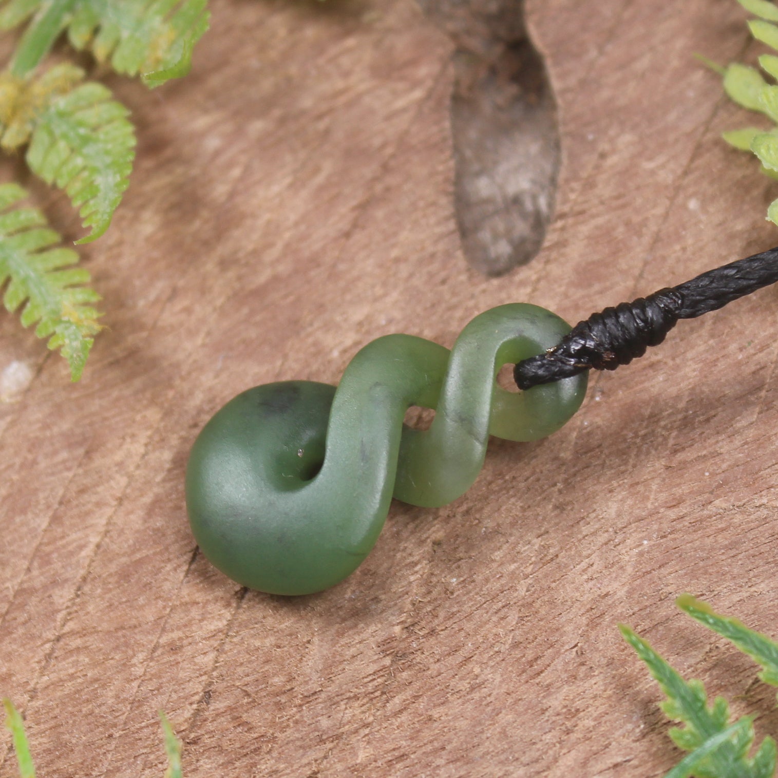 Twist or Pikorua carved from Hapopo Pounamu - NZ Greenstone