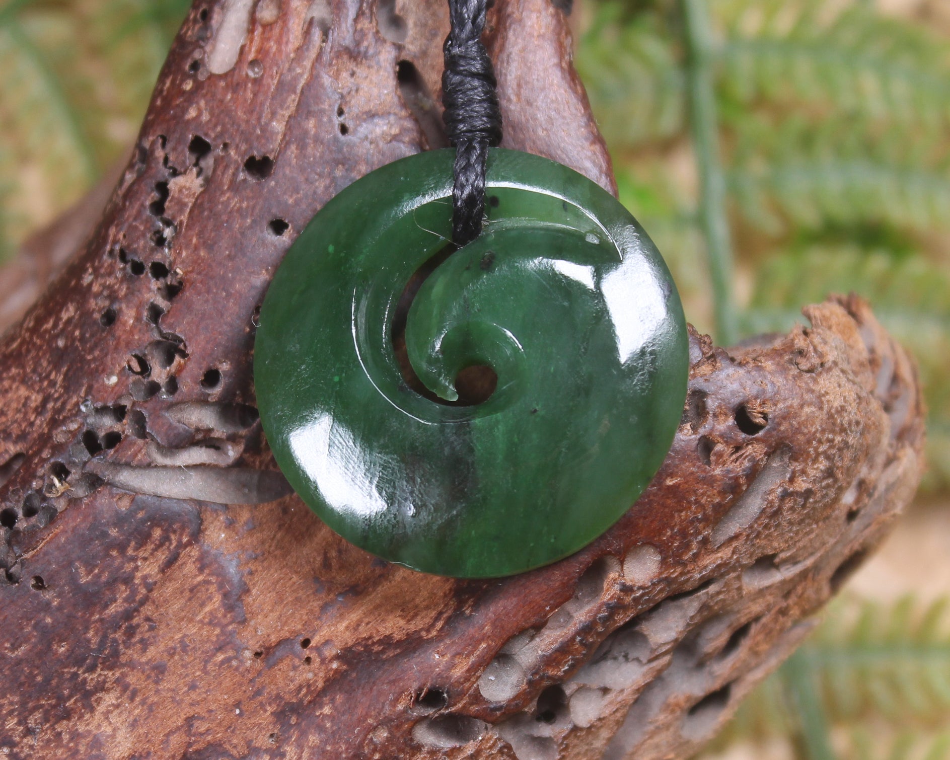 Koru pendant carved from Kawakawa Pounamu - NZ Greenstone
