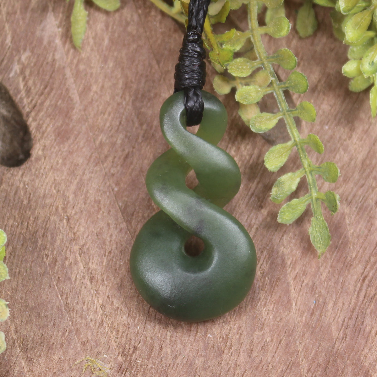 Twist or Pikorua carved from Hapopo Pounamu - NZ Greenstone