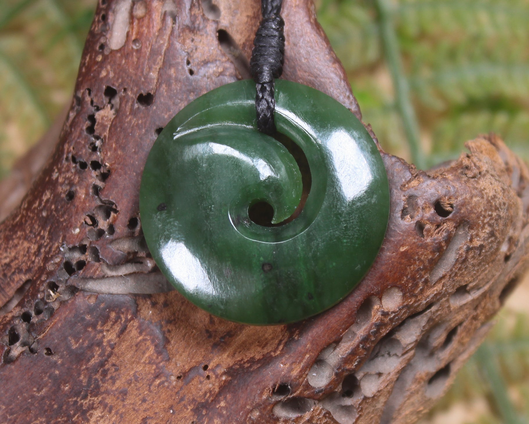 Koru pendant carved from Kawakawa Pounamu - NZ Greenstone