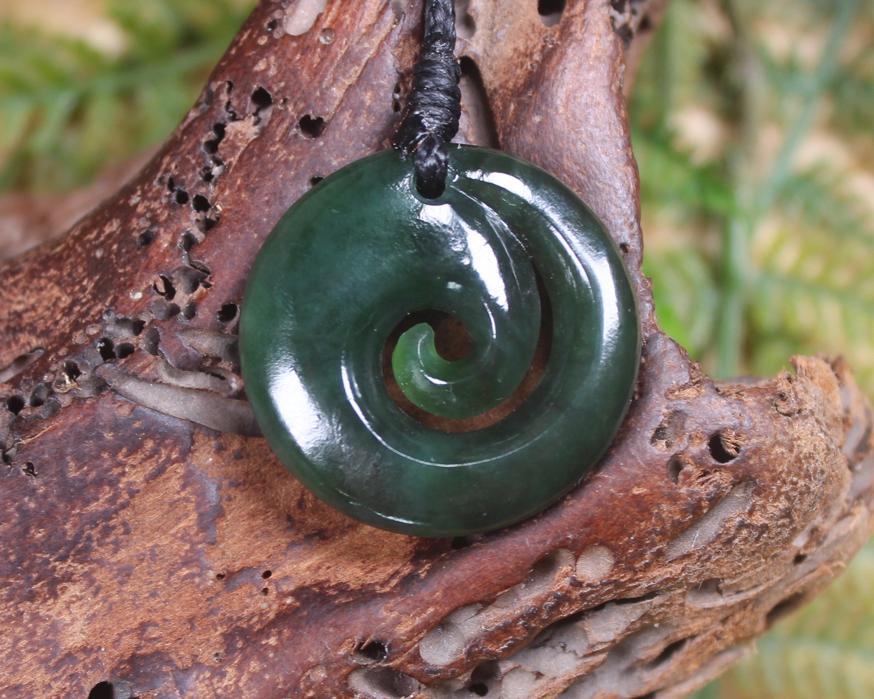 Koru pendant carved from Kawakawa Pounamu - NZ Greenstone