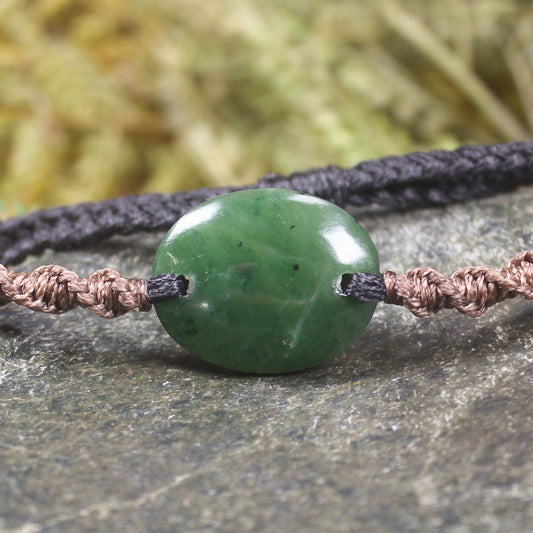 Adjustable cord bracelet with Kawakawa Pounamu