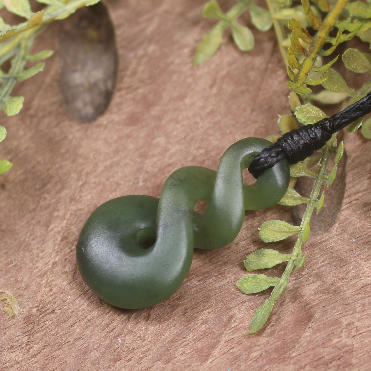 Twist or Pikorua carved from Hapopo Pounamu - NZ Greenstone