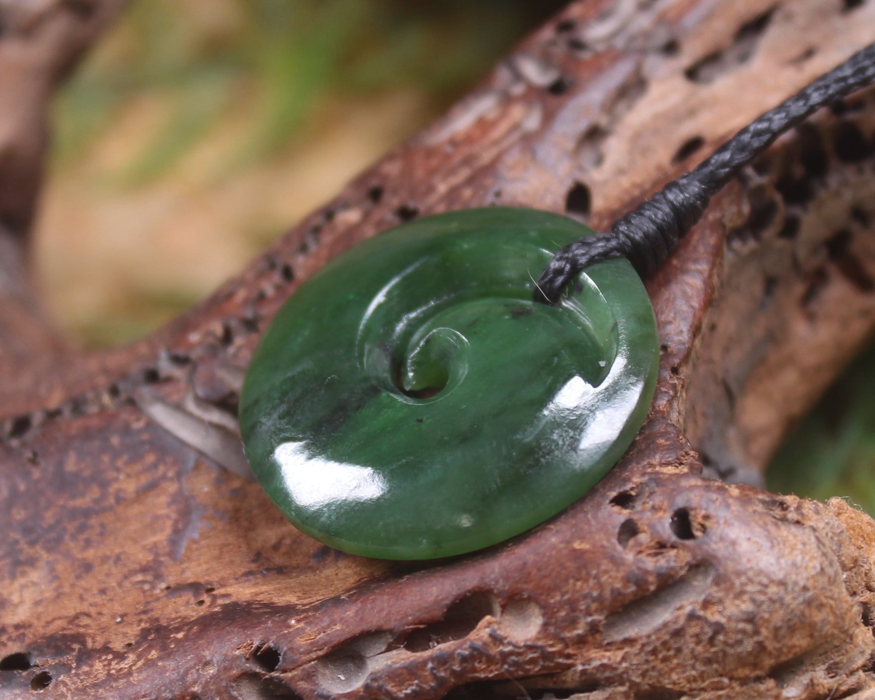 Koru pendant carved from Kawakawa Pounamu - NZ Greenstone