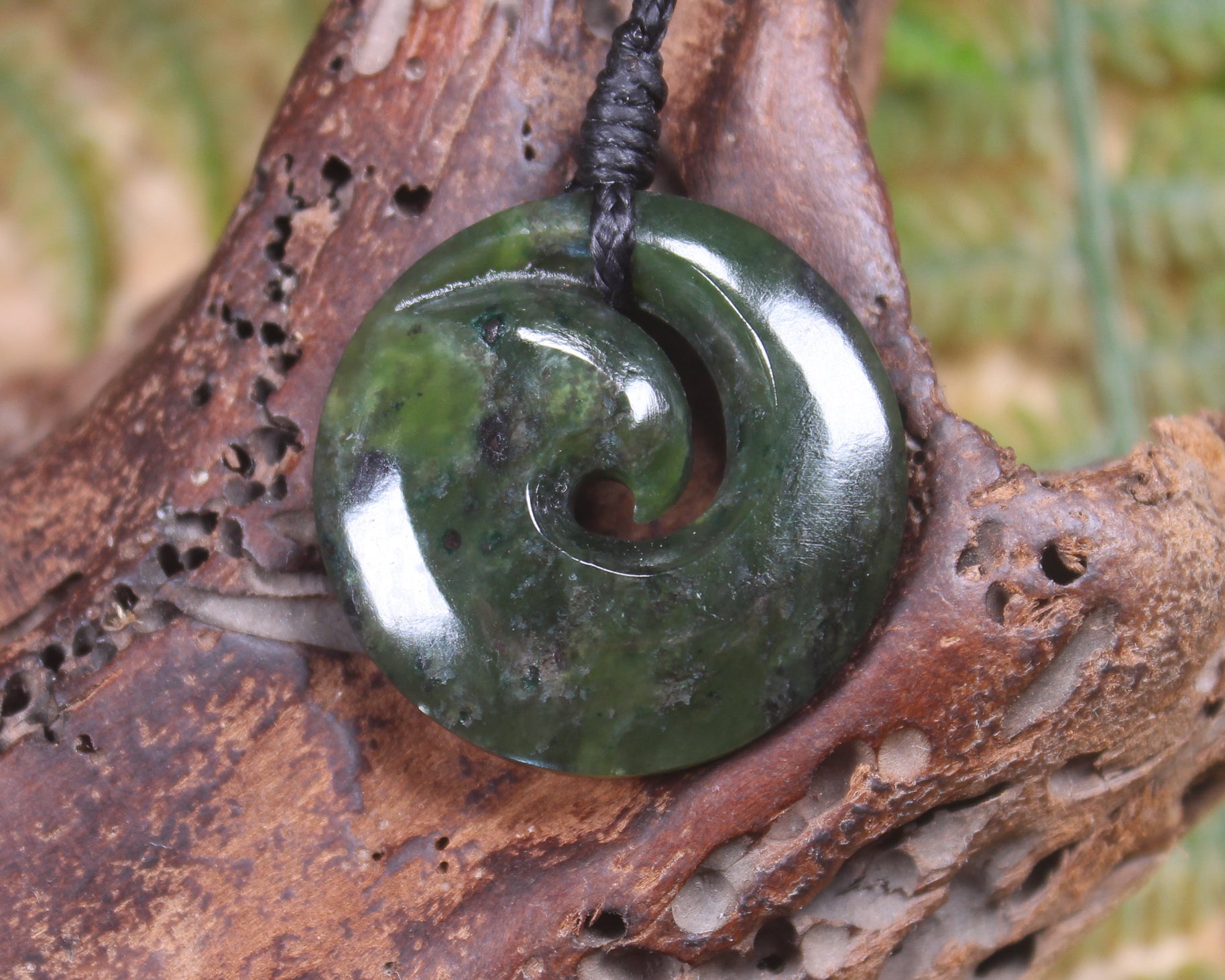 Koru carved from Rimu Pounamu - NZ Greenstone