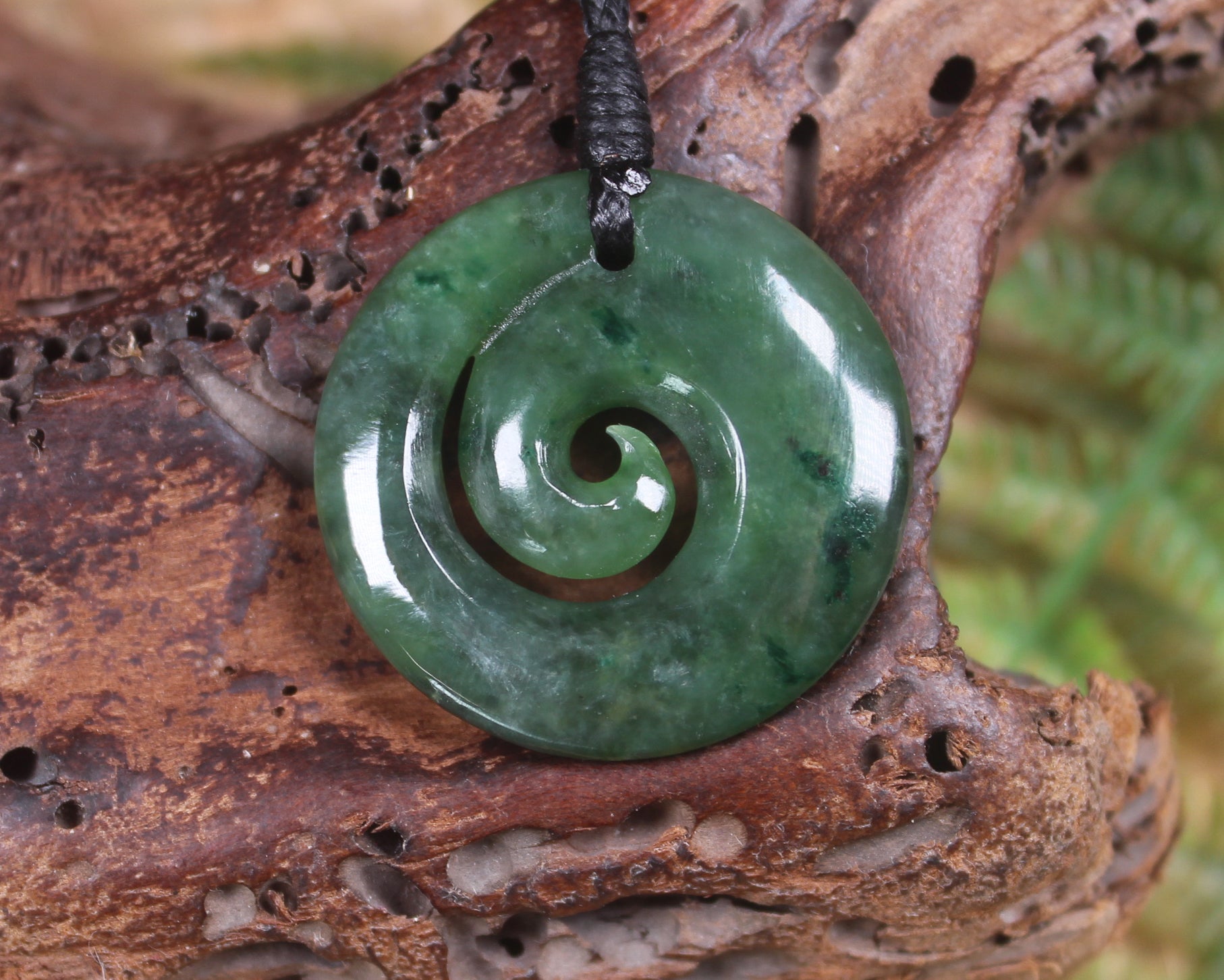 Koru pendant carved from Kawakawa Pounamu - NZ Greenstone