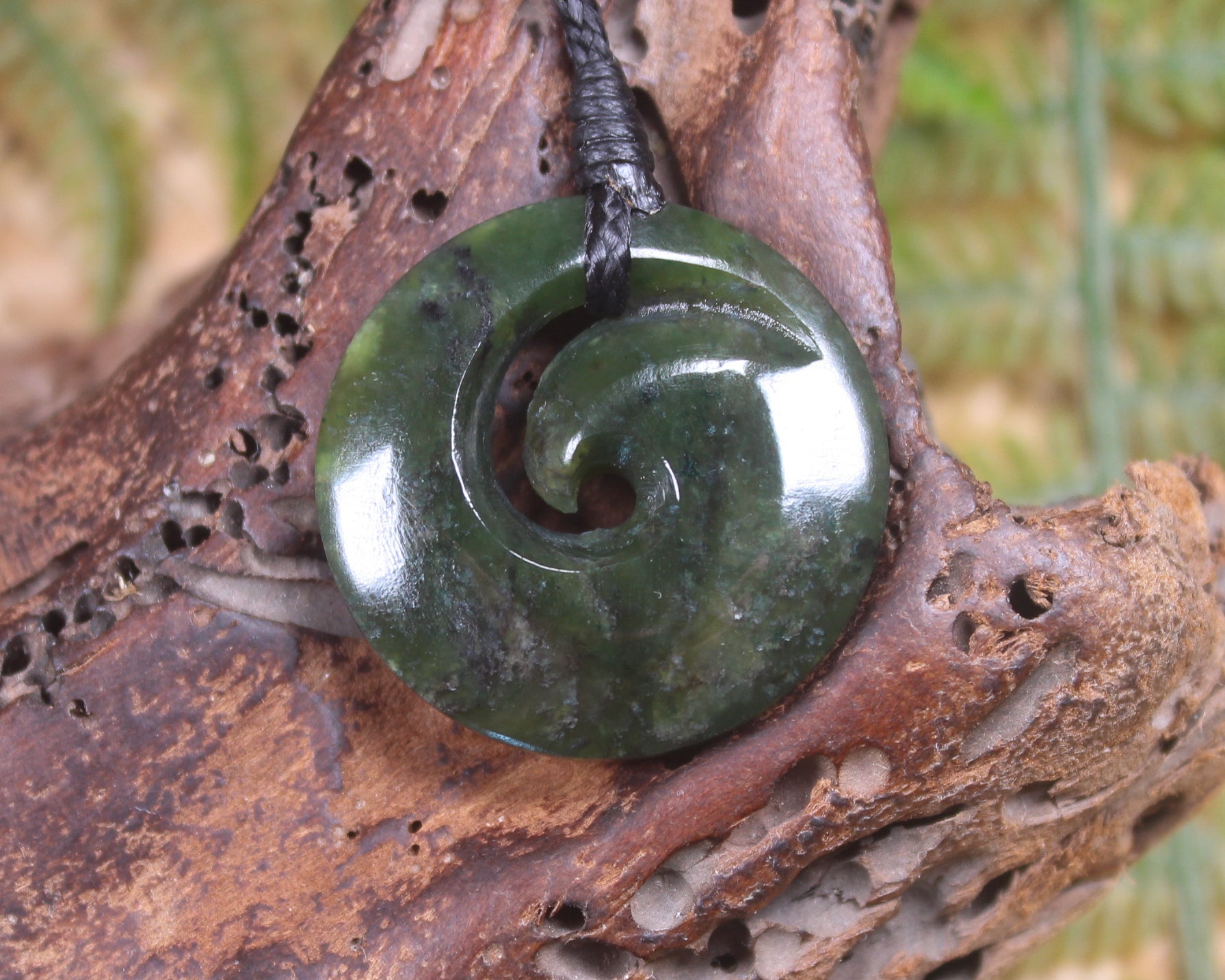 Koru carved from Rimu Pounamu - NZ Greenstone