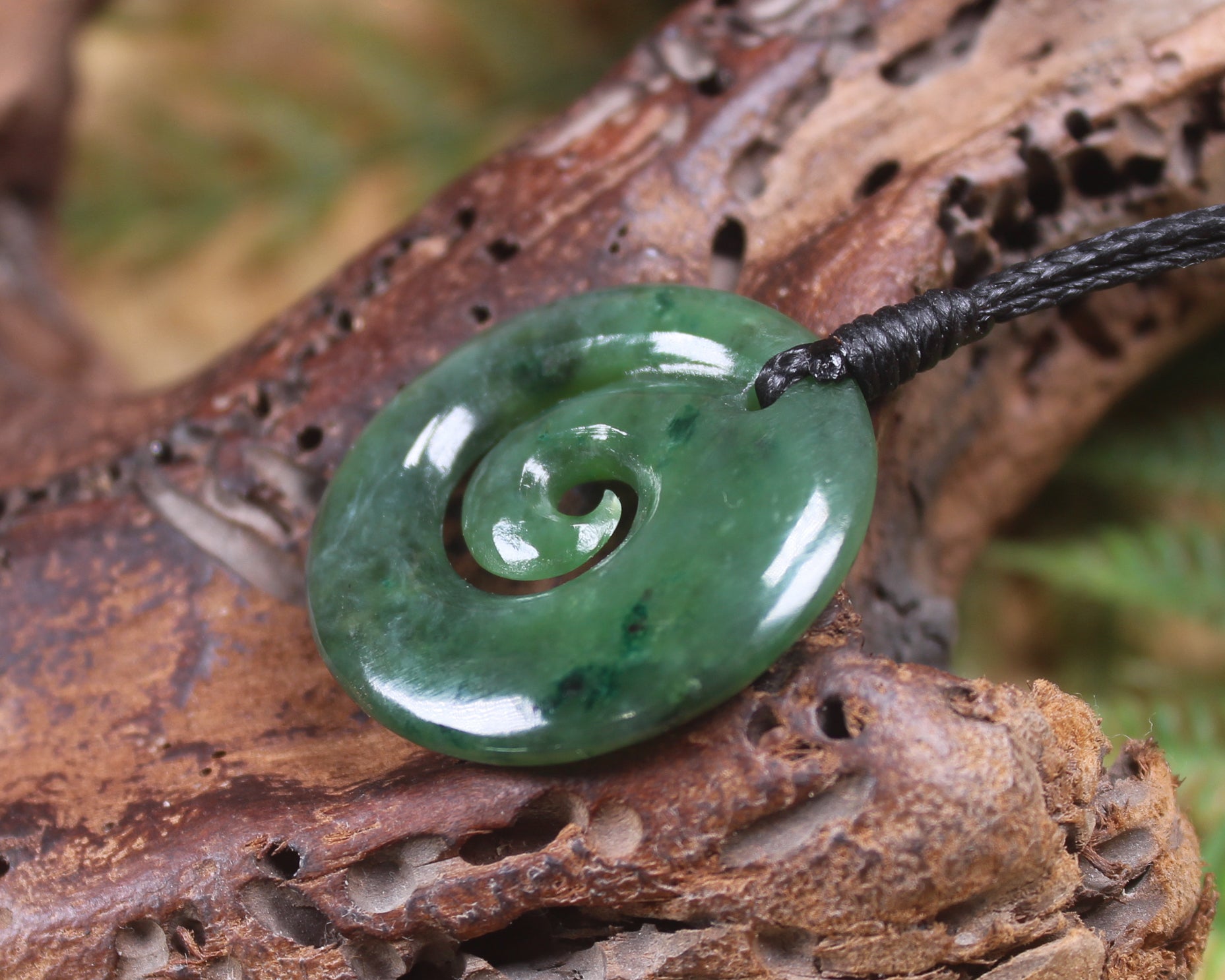 Koru pendant carved from Kawakawa Pounamu - NZ Greenstone