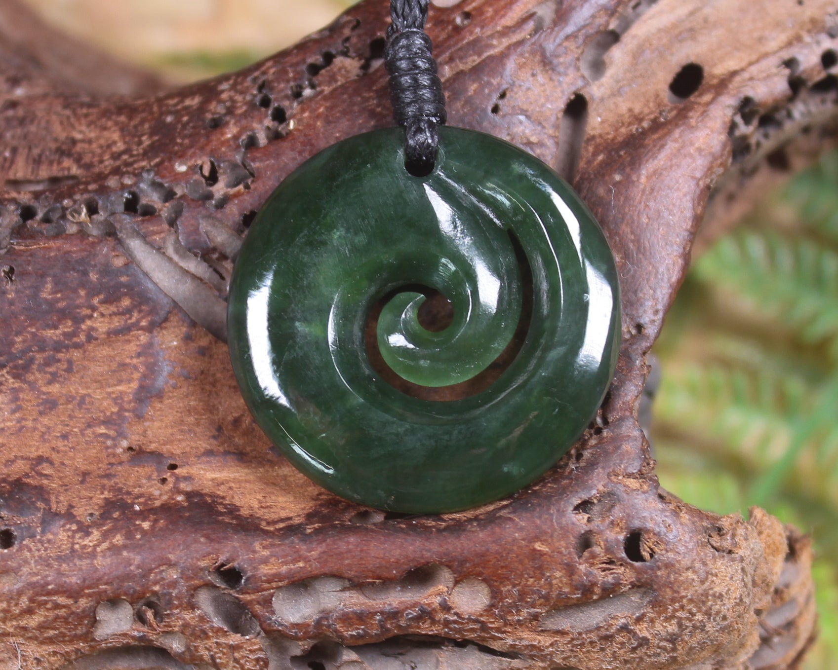 Koru pendant carved from Kawakawa Pounamu - NZ Greenstone