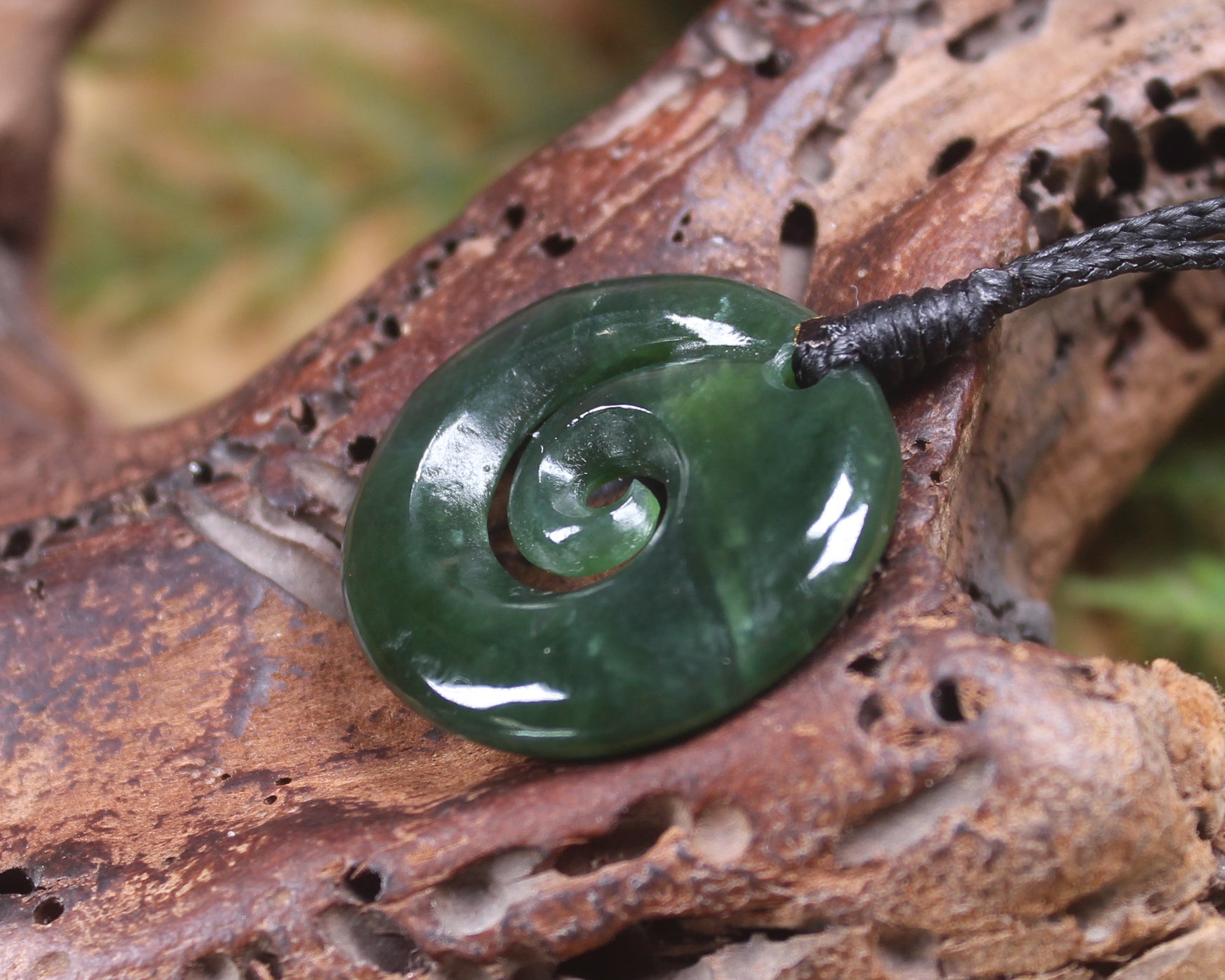 Koru pendant carved from Kawakawa Pounamu - NZ Greenstone