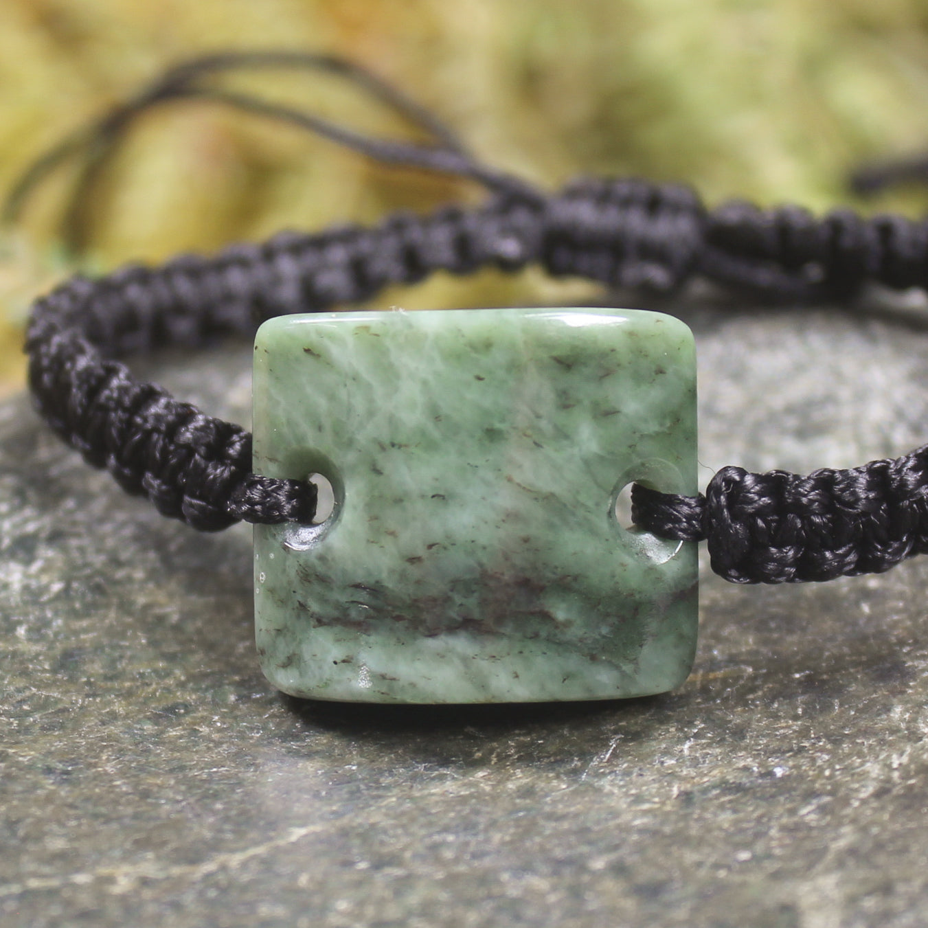 Adjustable cord bracelet with Hapopo Pounamu