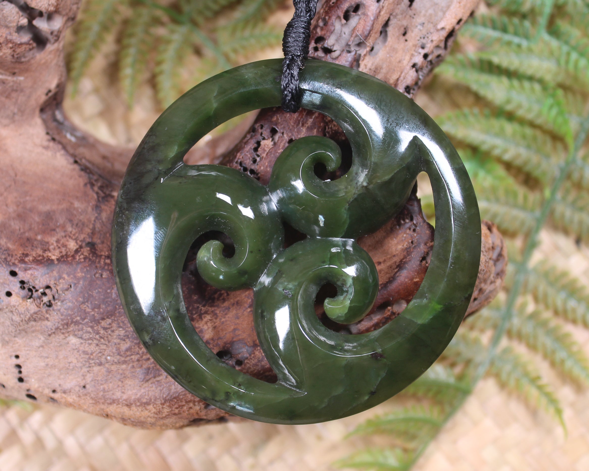 Koru carved from Rimu Pounamu - NZ Greenstone