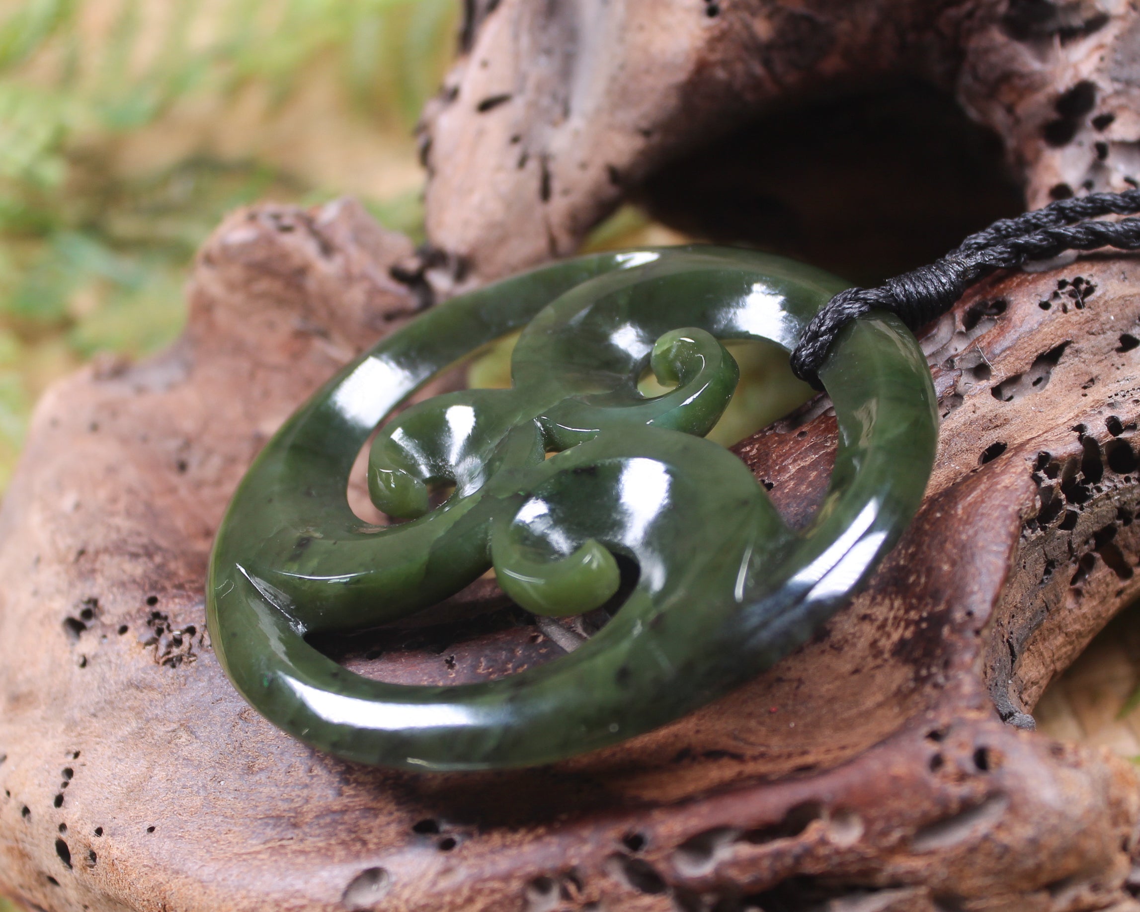 Koru carved from Rimu Pounamu - NZ Greenstone