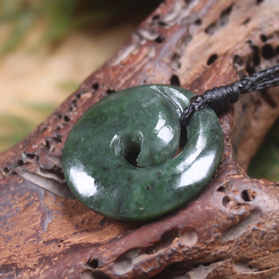 Koru pendant carved from Kawakawa Pounamu - NZ Greenstone