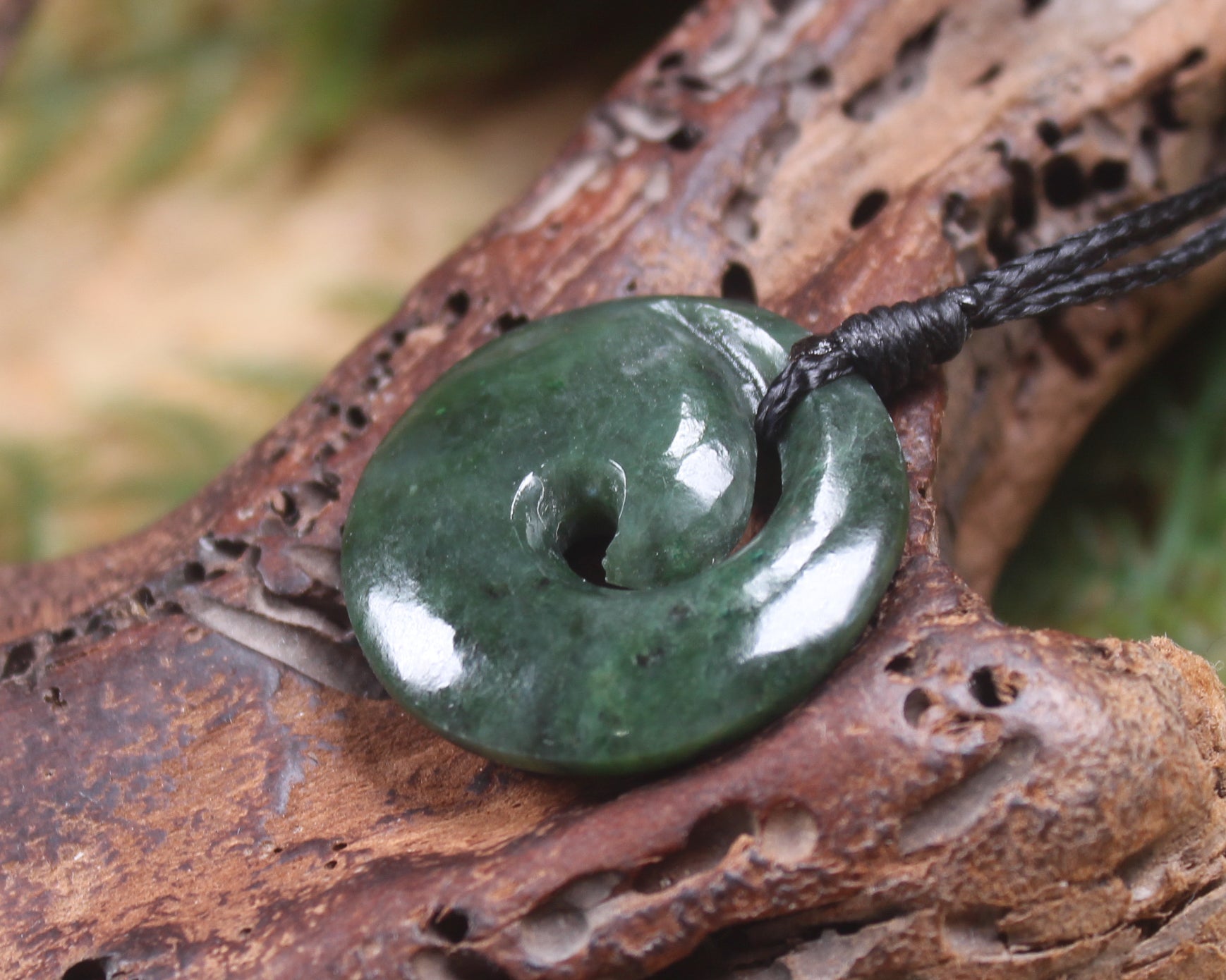 Koru pendant carved from Kawakawa Pounamu - NZ Greenstone