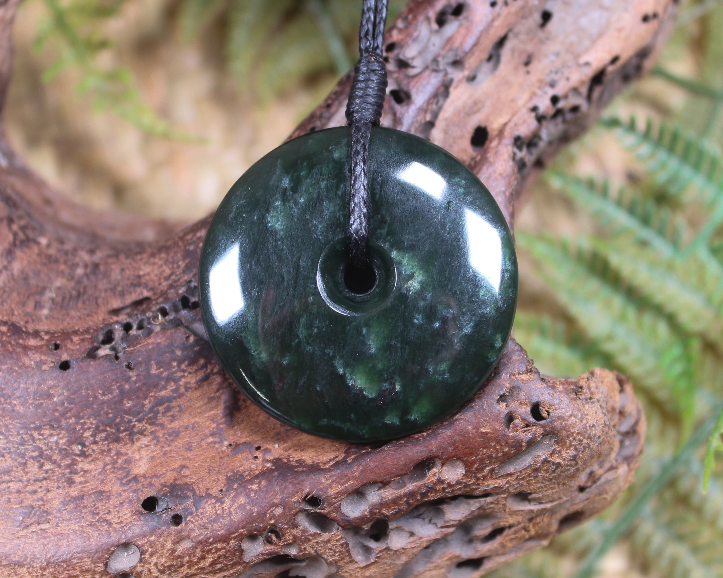 Porowhita or Pi Stone carved from Kawakawa Pounamu - NZ Greenstone