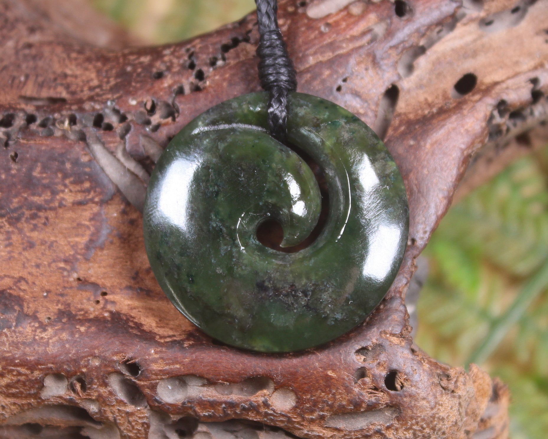Koru carved from Rimu Pounamu - NZ Greenstone