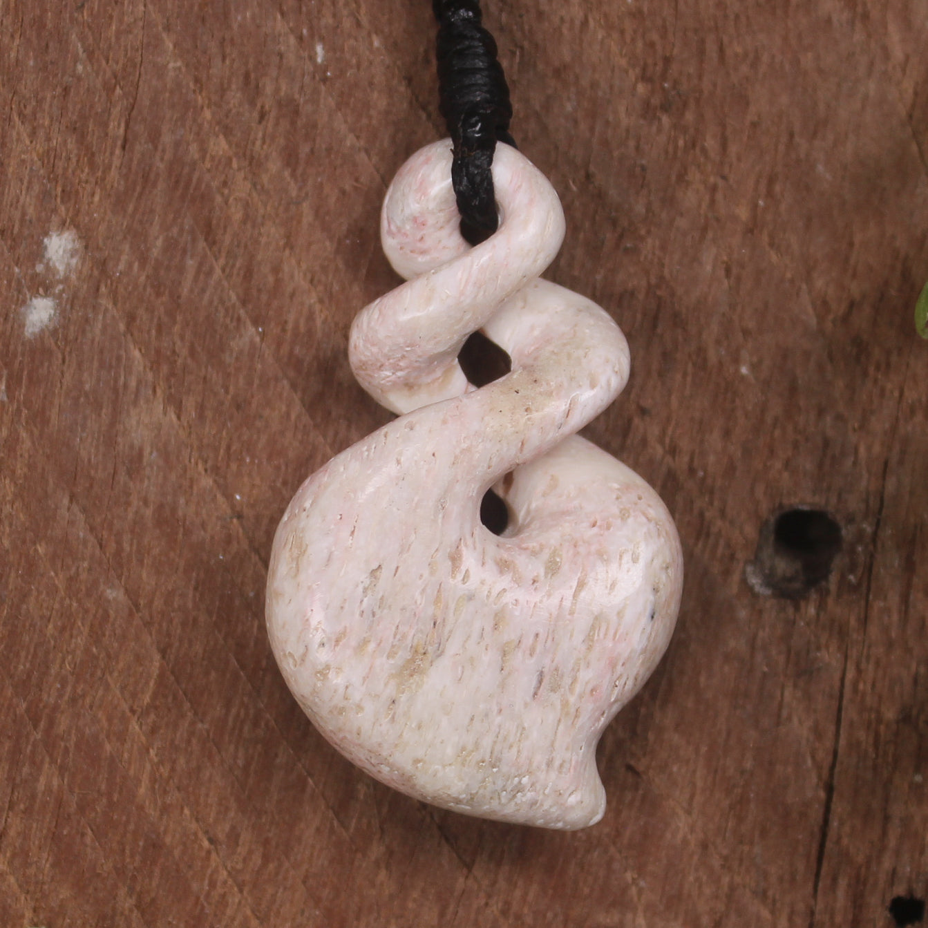 Whale bone twist pendant