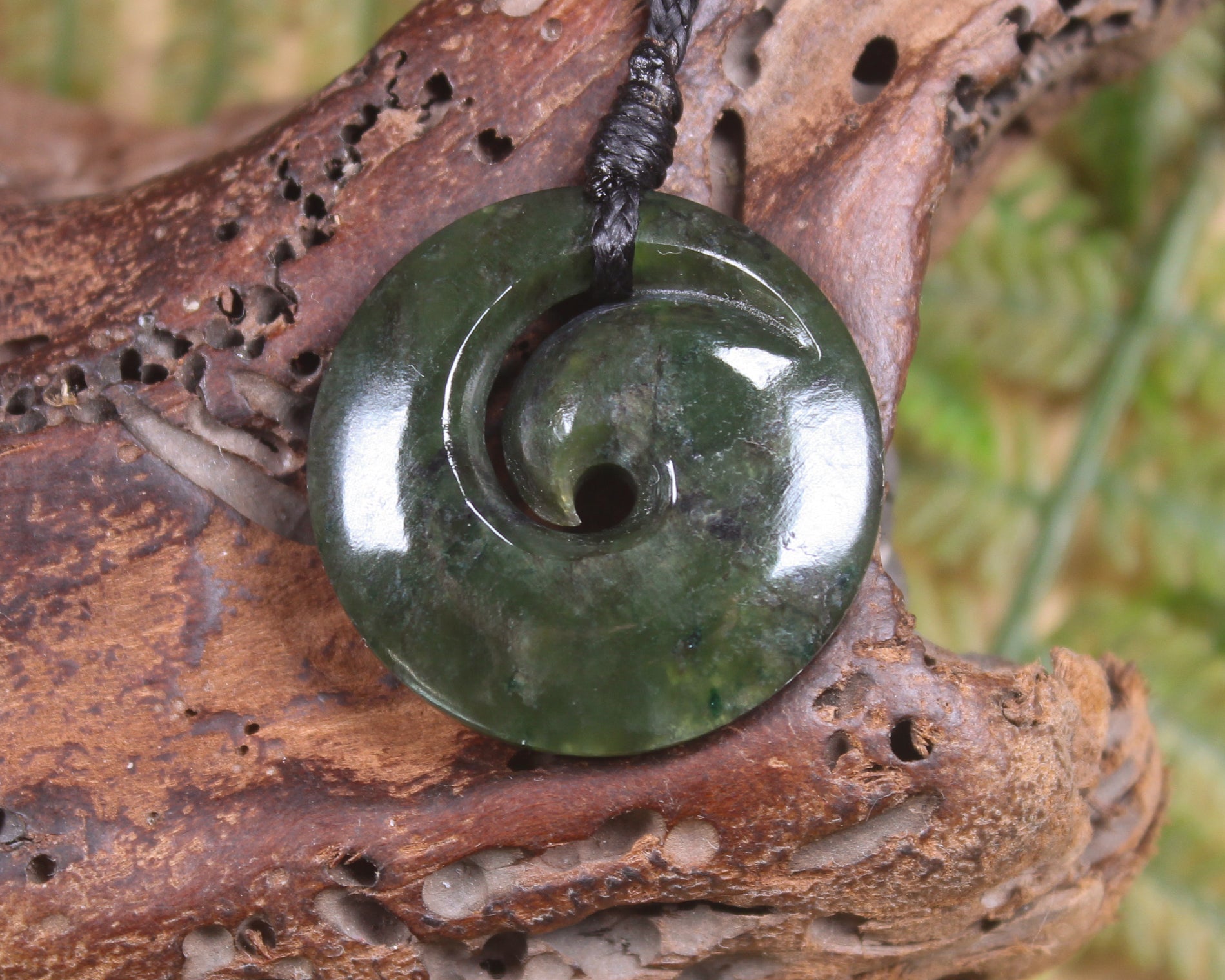 Koru carved from Rimu Pounamu - NZ Greenstone