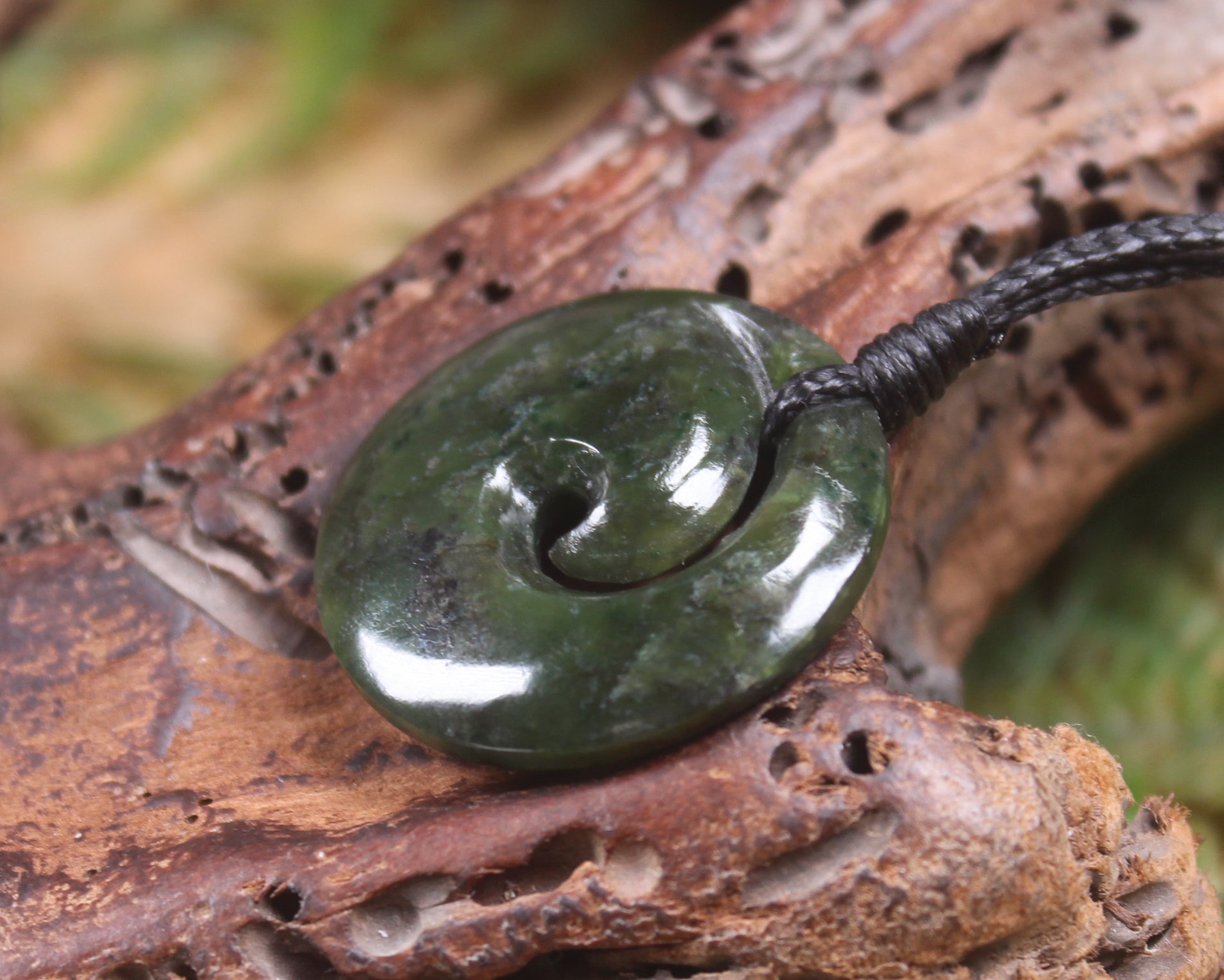 Koru carved from Rimu Pounamu - NZ Greenstone