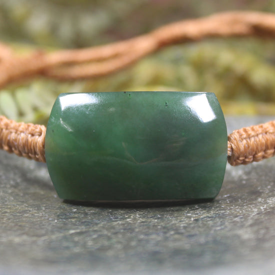 Adjustable cord bracelet with Hapopo Pounamu