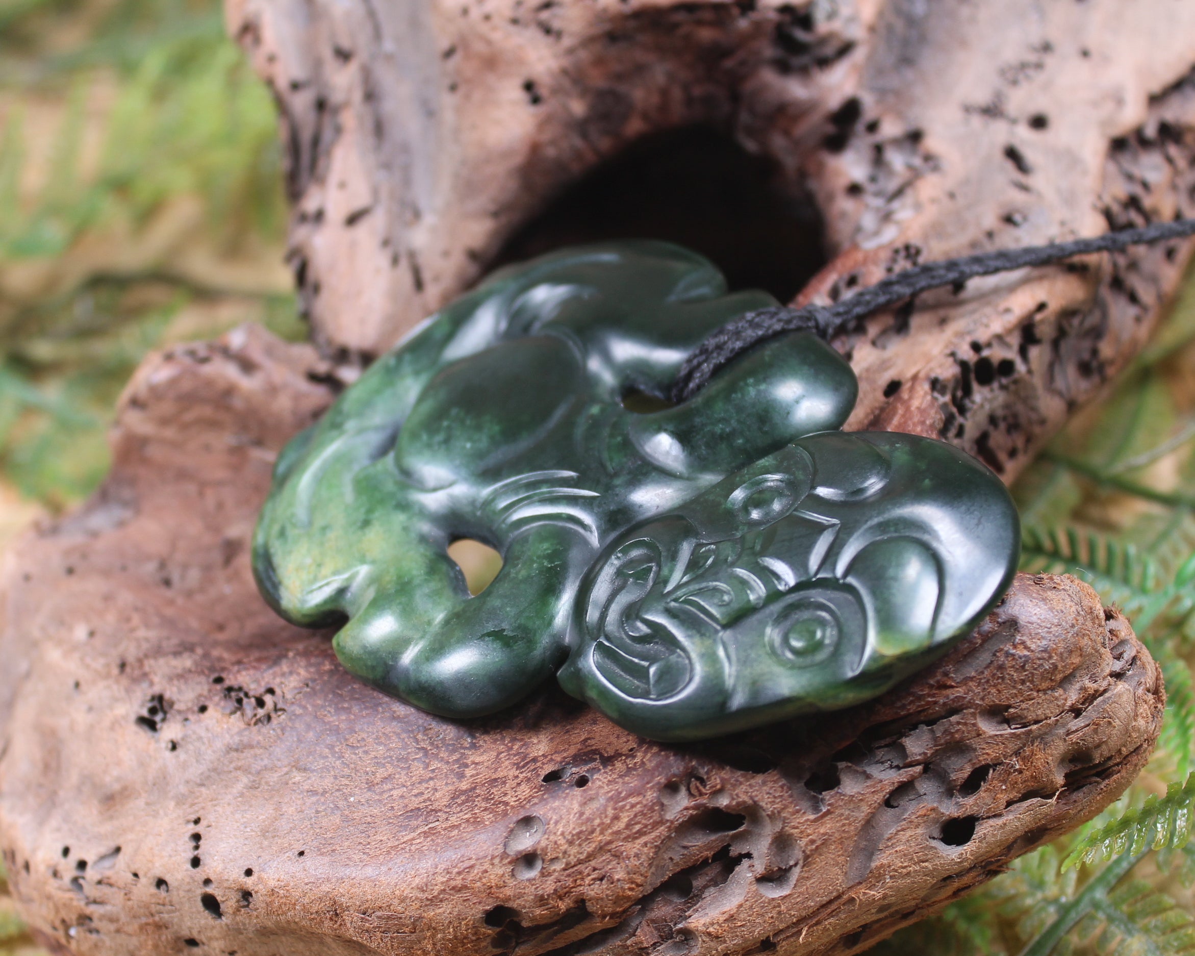 Hei Tiki carved from Flower Jade Pounamu - NZ Greenstone