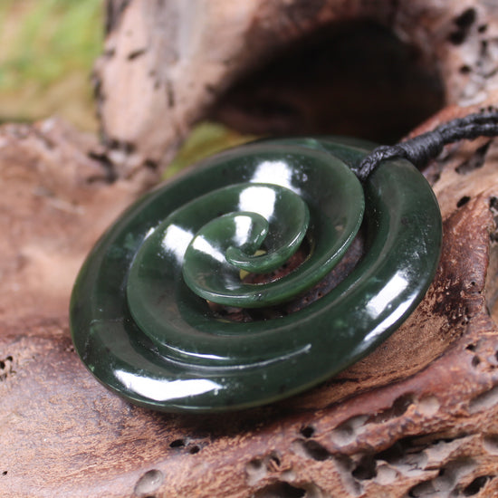 Koru pendant carved from Kawakawa Pounamu - NZ Greenstone