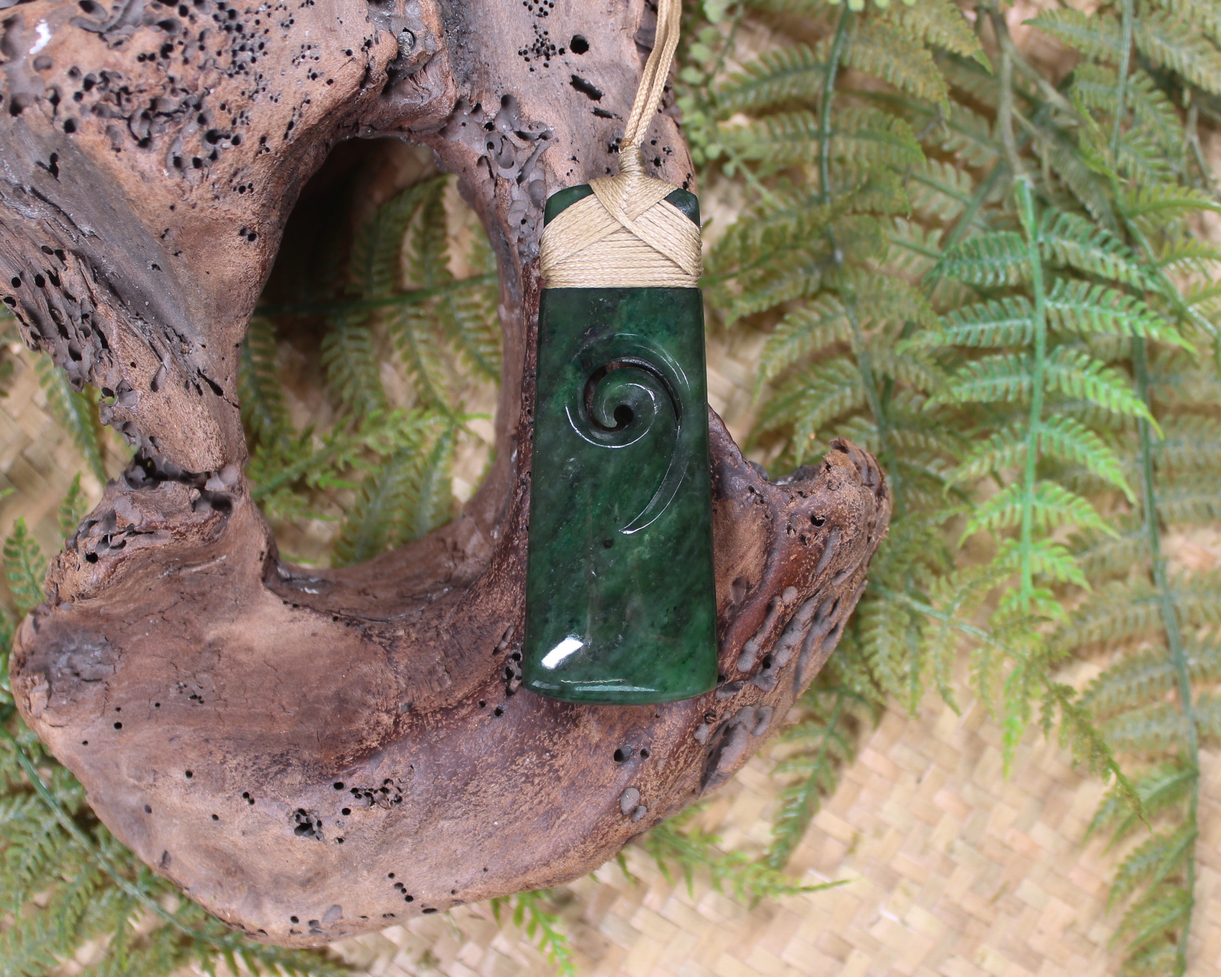 Toki with Koru carved from Kawakawa Pounamu