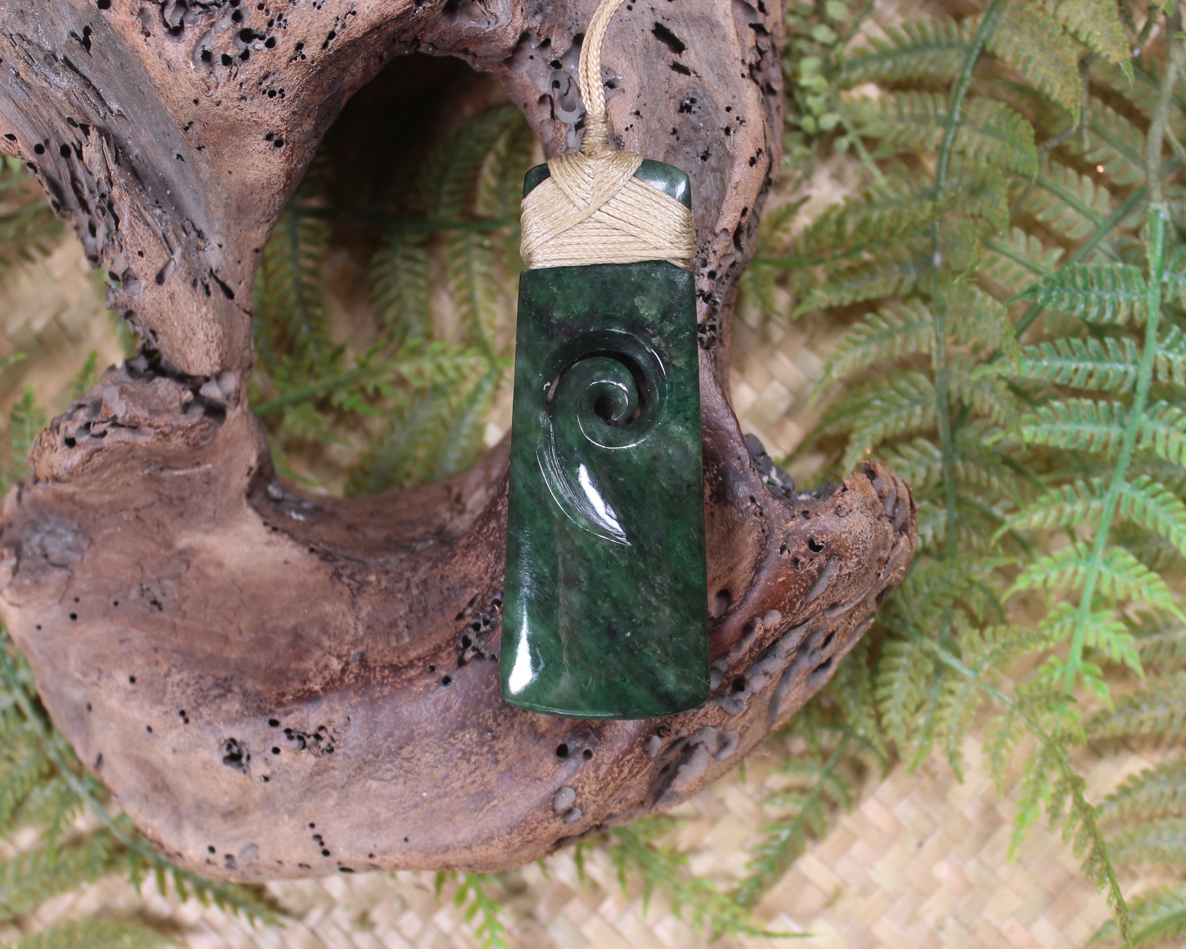 Toki with Koru carved from Kawakawa Pounamu