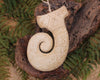 Matau sculpture carved from Whale Bone