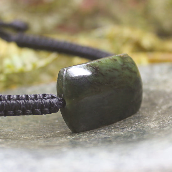 Adjustable cord bracelet with Rimu Pounamu