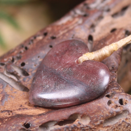 Heart carved from Rhodonite 