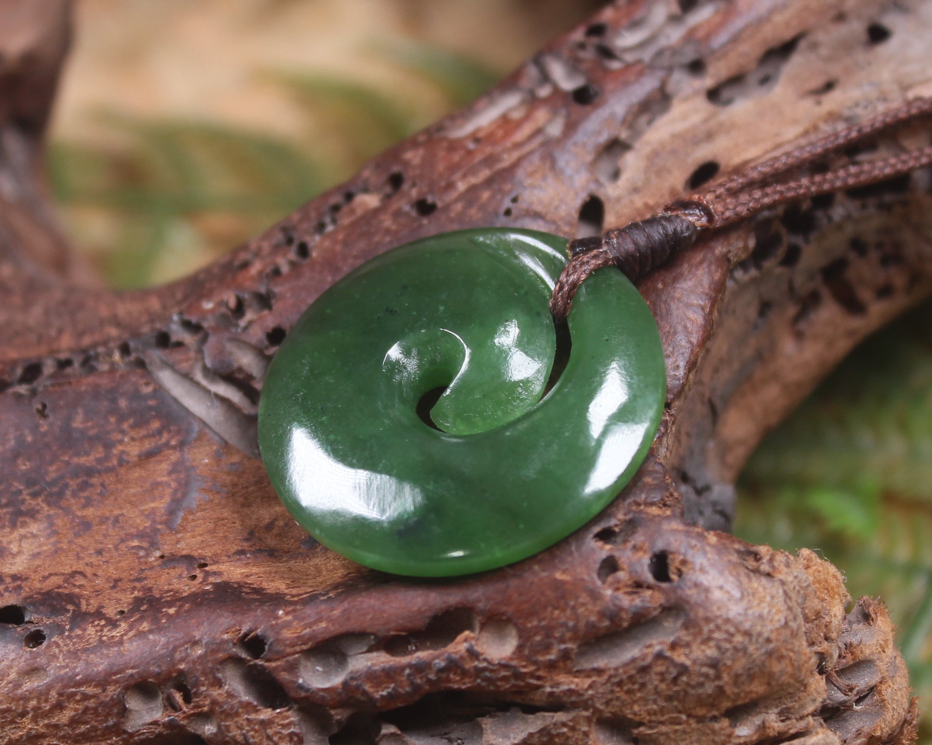 Koru pendant carved from Kawakawa Pounamu - NZ Greenstone