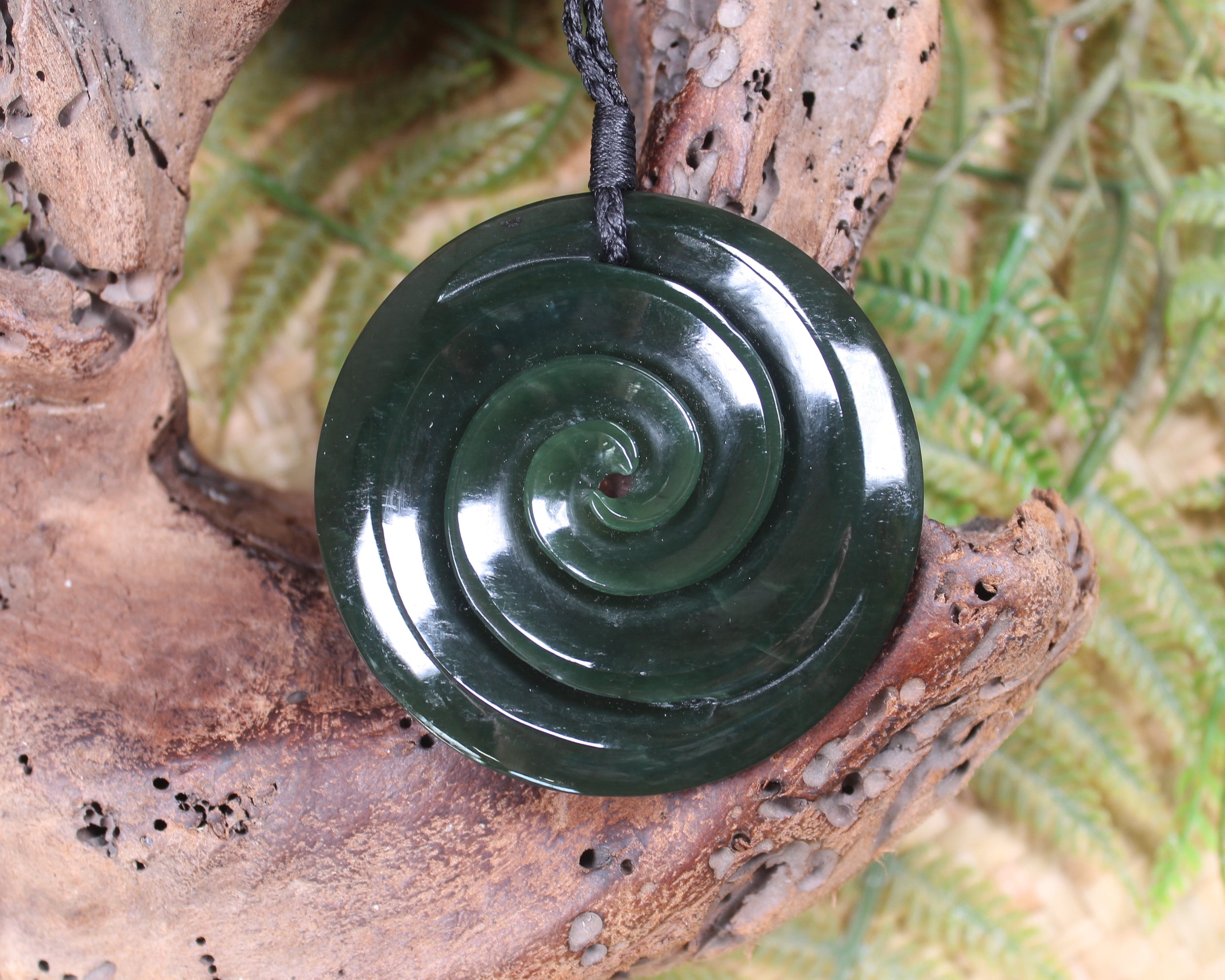 Koru pendant carved from Kawakawa Pounamu - NZ Greenstone