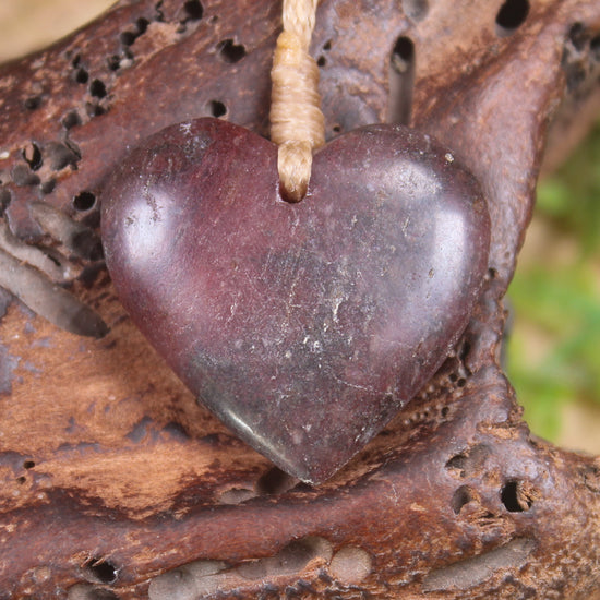 Heart carved from Rhodonite 