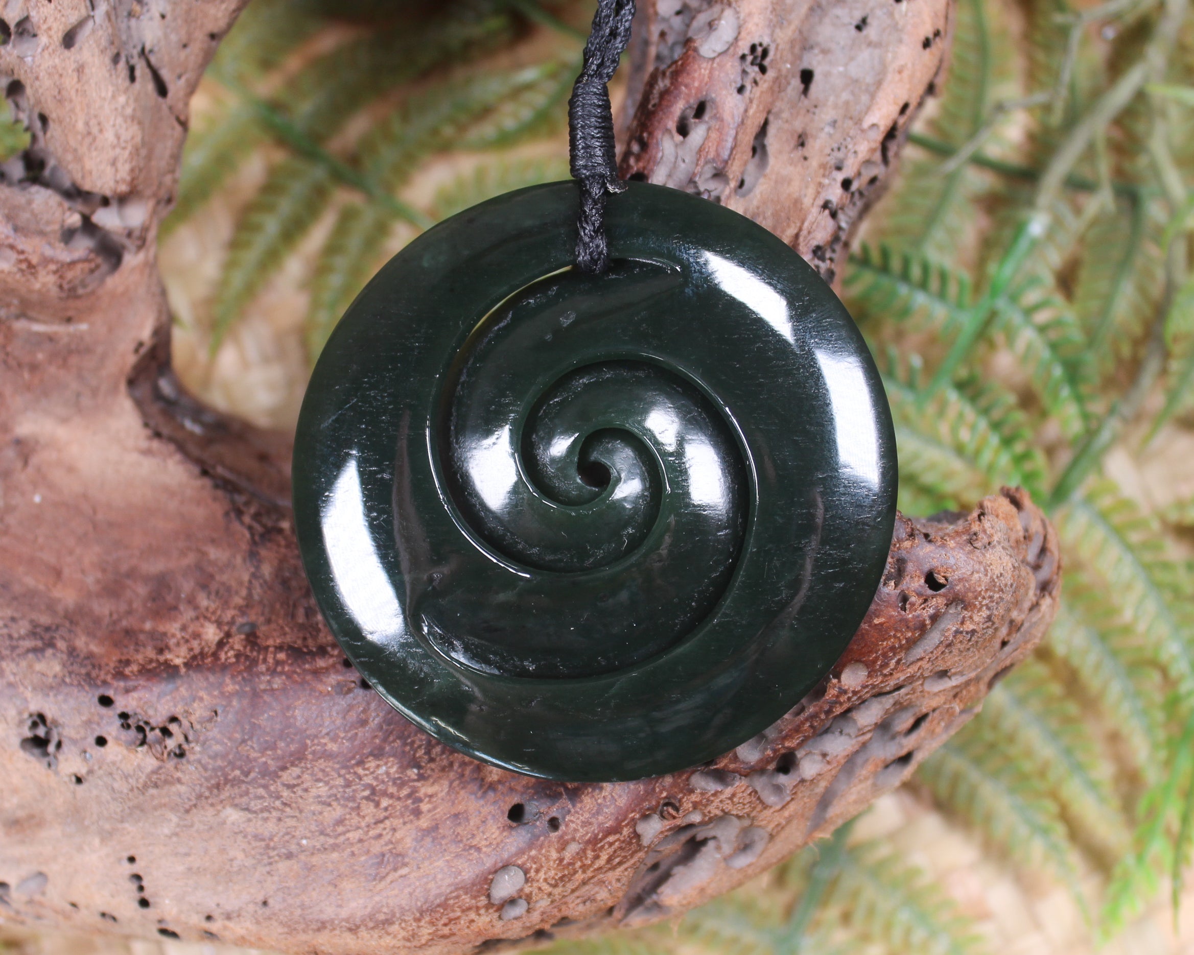 Koru pendant carved from Kawakawa Pounamu - NZ Greenstone