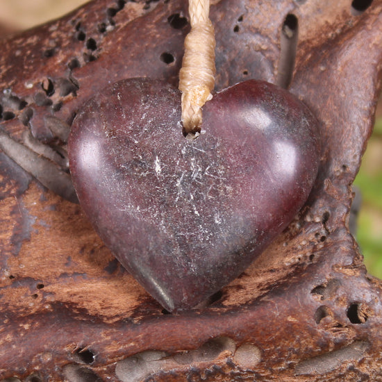 Heart carved from Rhodonite 