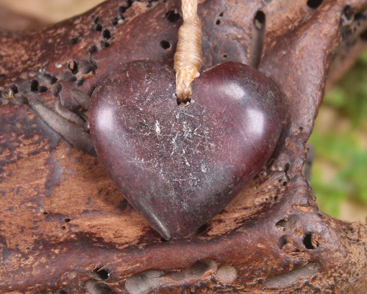 Heart carved from Rhodonite 