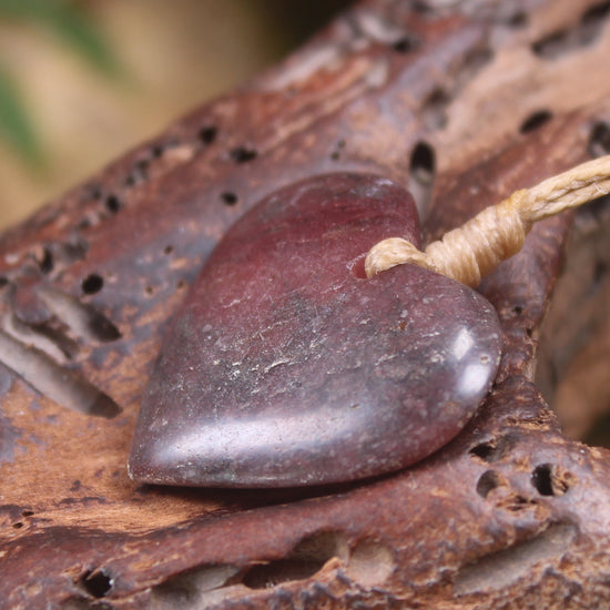 Heart carved from Rhodonite 