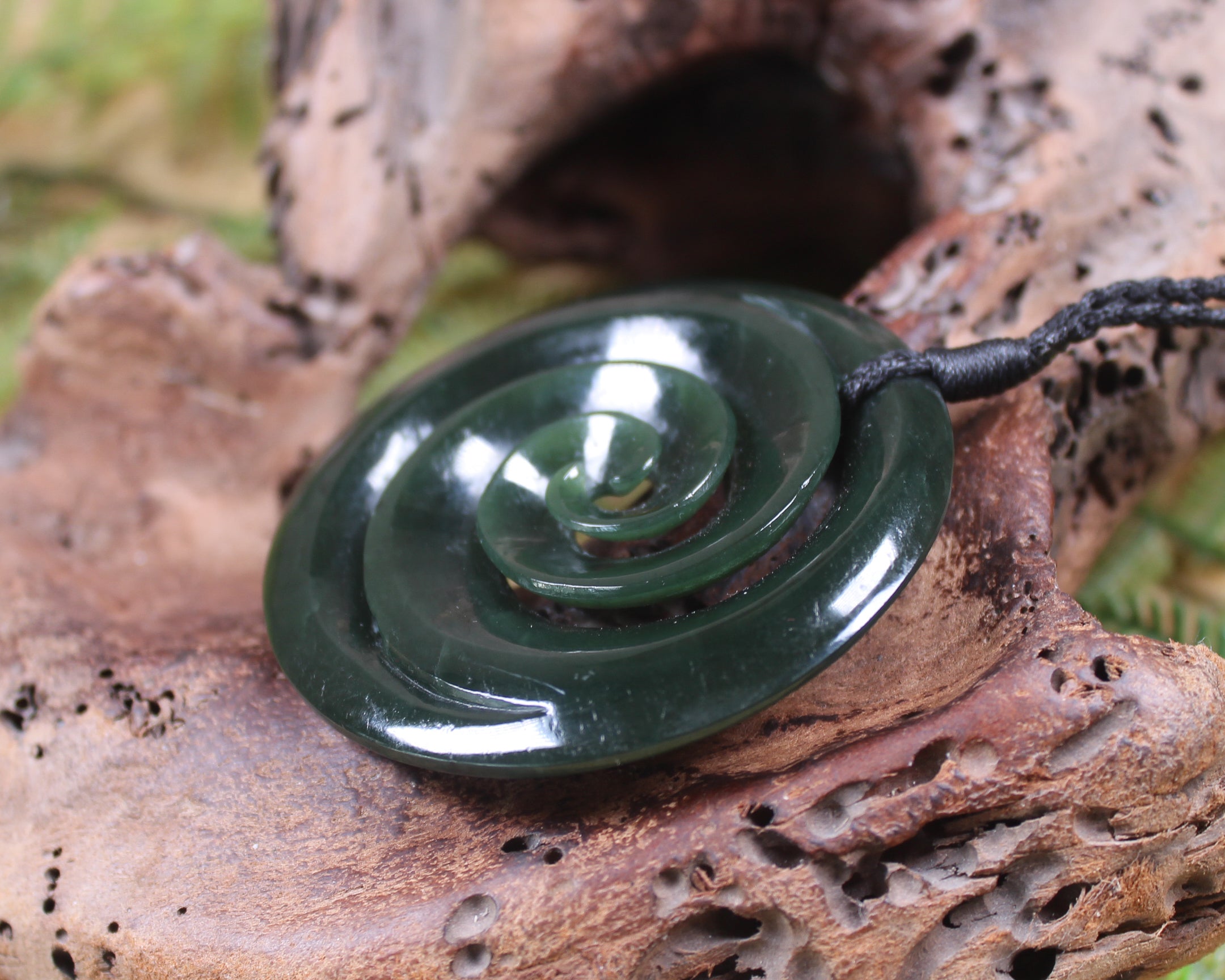 Koru pendant carved from Kawakawa Pounamu - NZ Greenstone