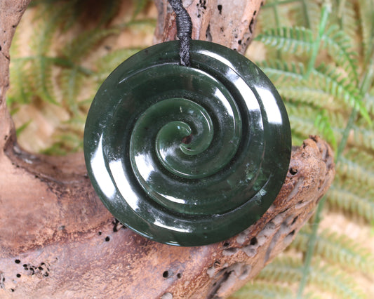 Koru carved from Rimu Pounamu - NZ Greenstone