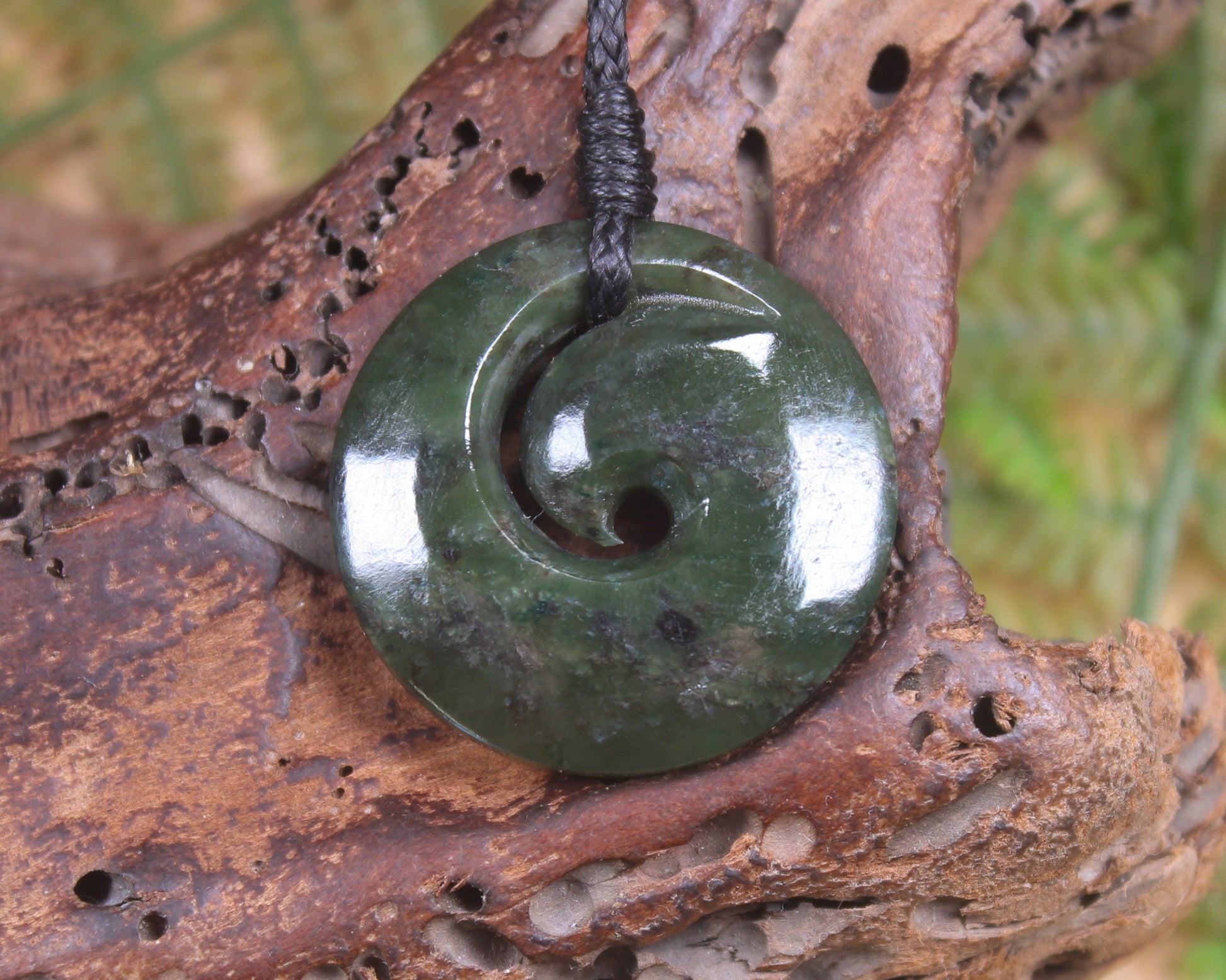 Koru carved from Rimu Pounamu - NZ Greenstone