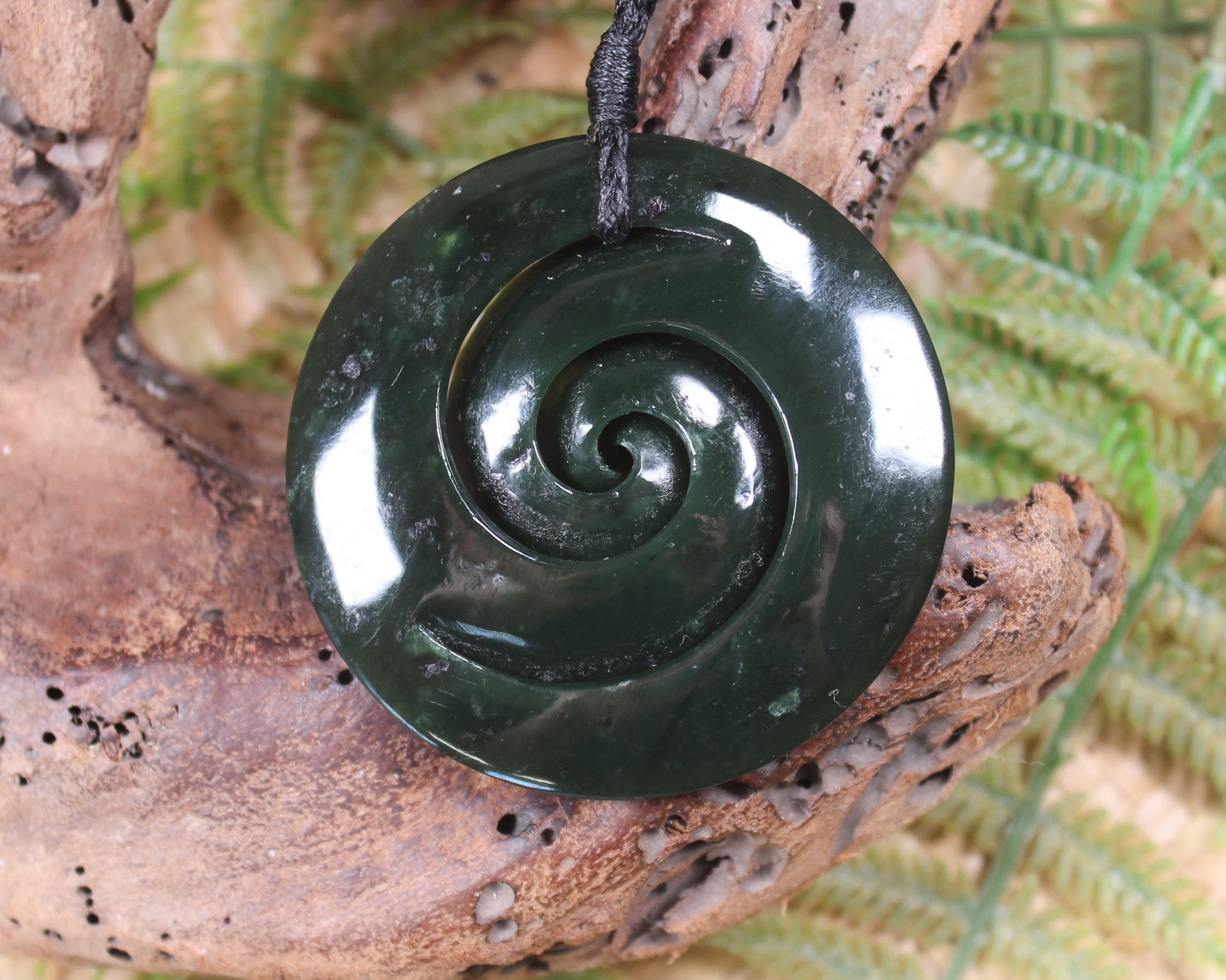 Koru carved from Rimu Pounamu - NZ Greenstone