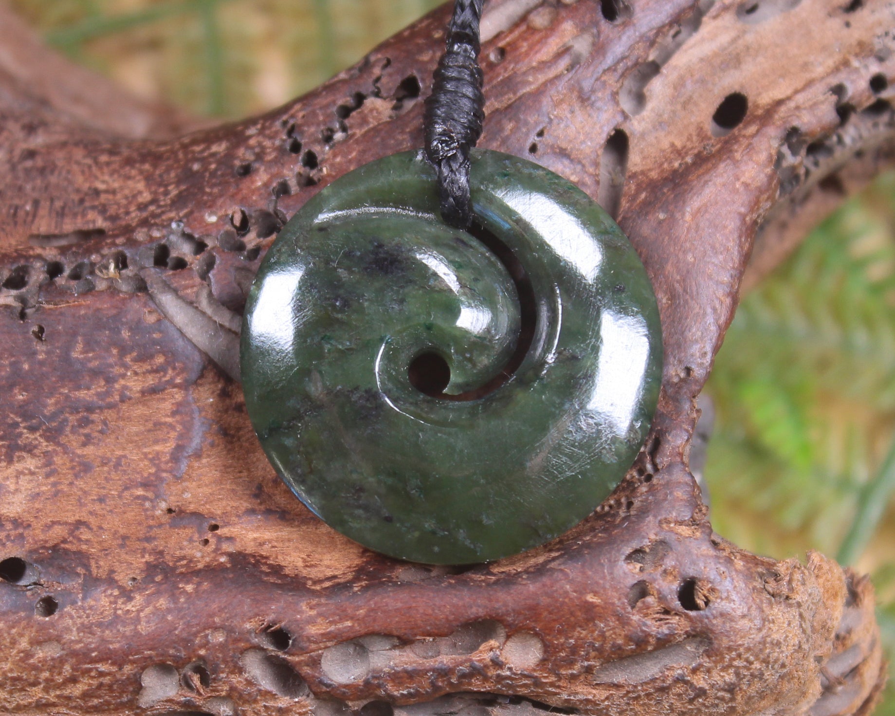 Koru carved from Rimu Pounamu - NZ Greenstone