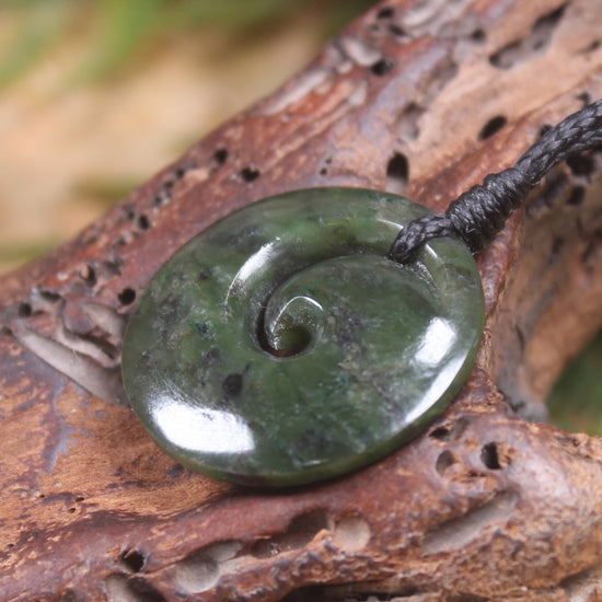 Koru carved from Rimu Pounamu - NZ Greenstone