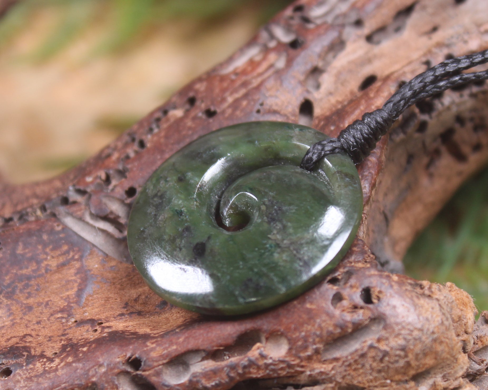 Koru carved from Rimu Pounamu - NZ Greenstone