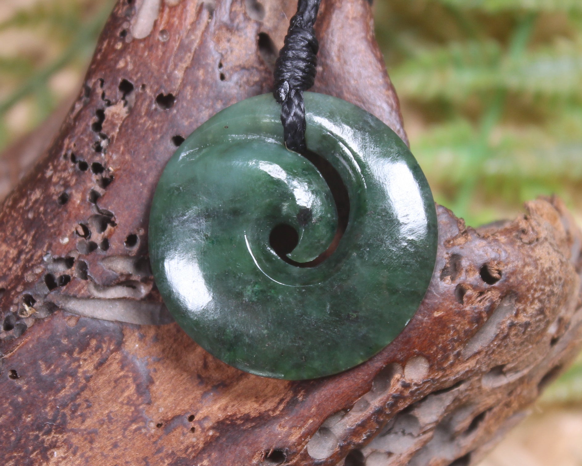 Koru pendant carved from Kawakawa Pounamu - NZ Greenstone